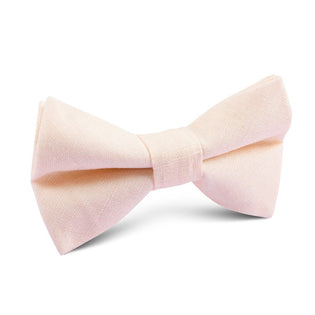 Blush pink slub linen children’s bow tie on a white background