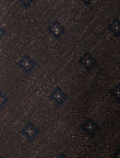 Darkwood Medallion Necktie - knotted view, navy medallion linen - OTAA